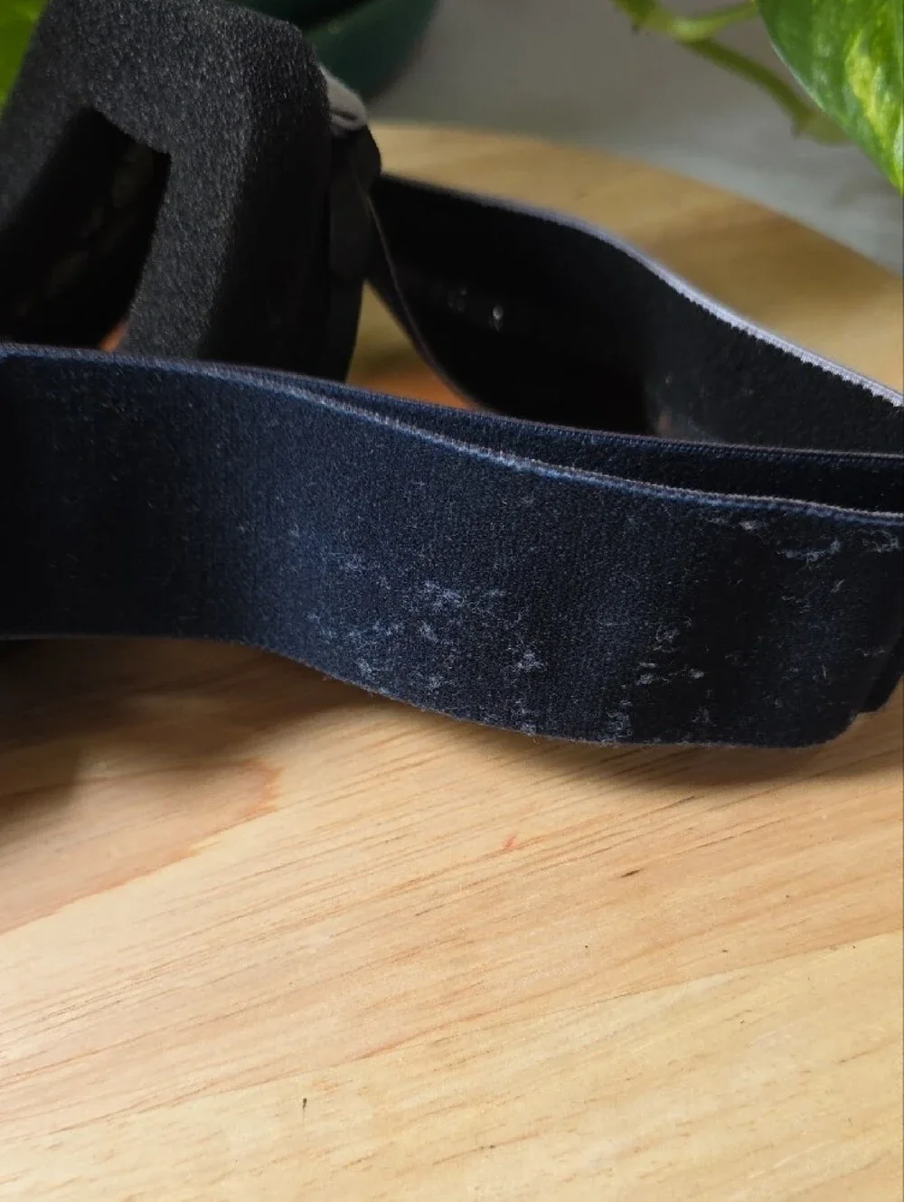 Smith Optics snow goggles featuring a black strap with white branding